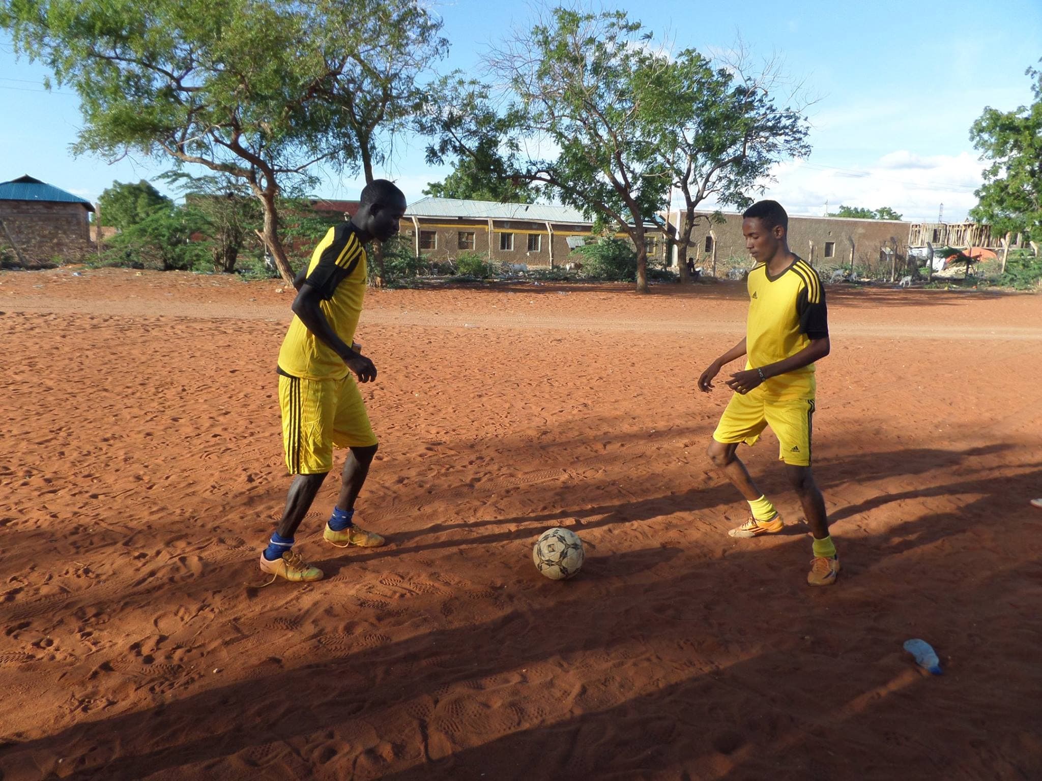 Young football players during a PHC community engagement activity